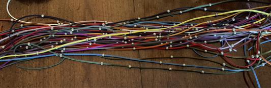Beaded suede ties